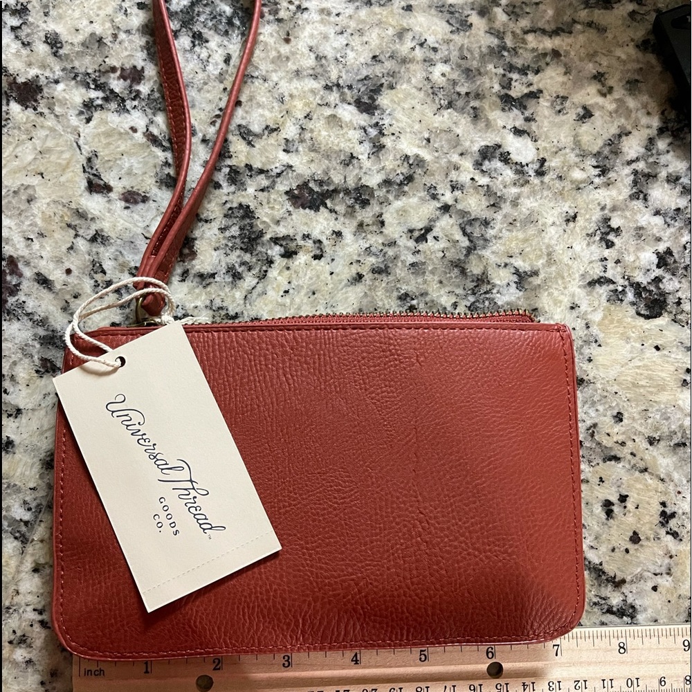 Small zip closure wristlet